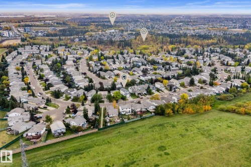Expansive green space bordering a residential community of single-family homes and mature trees - 362 Blackburn Drive E, Edmonton, AB - Outdoor With View