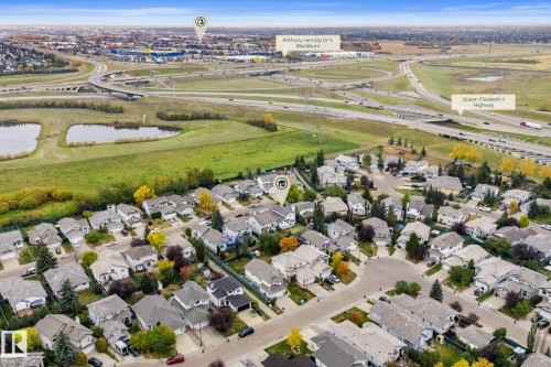 Residential community featuring numerous single-family homes, mature trees, and a network of streets - 362 Blackburn Drive E, Edmonton, AB - Outdoor With View