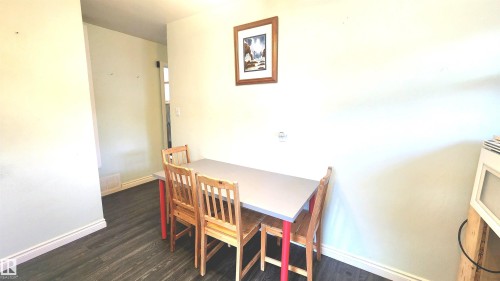 Dining area with wood-finish flooring and white baseboards - 12139 81 Street, Edmonton, AB - Indoor