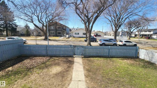 Front yard with a light blue picket fence and gate - 12139 81 Street, Edmonton, AB - Outdoor