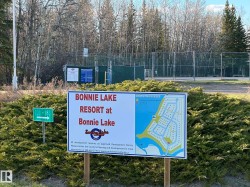 Resort signage for Bonnie Lake, featuring a site map indicating various lots - 