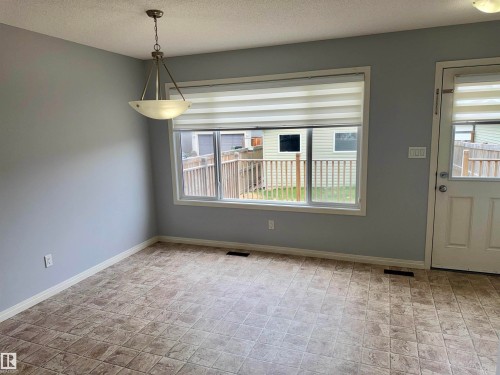 Neutral wall tones throughout - 4310 Prowse Link Link, Edmonton, AB - Indoor Photo Showing Other Room