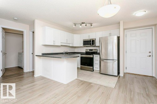 423 13625 34 Street, Edmonton, AB - Indoor Photo Showing Kitchen With Stainless Steel Kitchen
