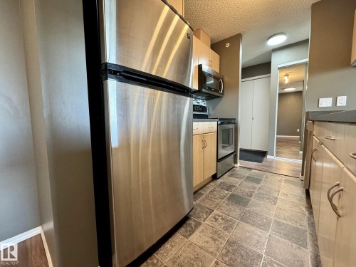 514 2430 Guardian Road, Edmonton, AB - Indoor Photo Showing Kitchen With Stainless Steel Kitchen