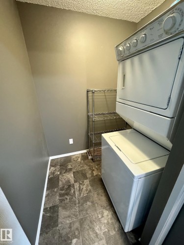 514 2430 Guardian Road, Edmonton, AB - Indoor Photo Showing Laundry Room