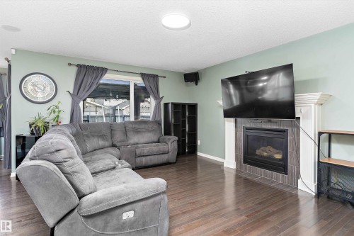 1332 72 Street, Edmonton, AB - Indoor Photo Showing Living Room With Fireplace