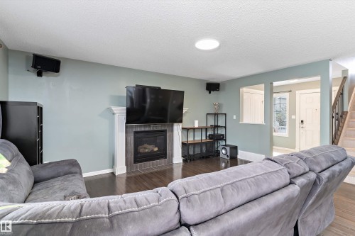1332 72 Street, Edmonton, AB - Indoor Photo Showing Living Room With Fireplace