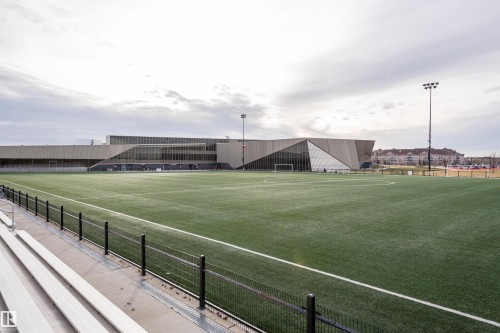 Expansive artificial turf sports field with integrated goal posts - 1-402 4245 139 Avenue, Edmonton, AB - Outdoor With View