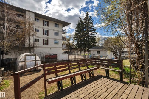 Wood-finish deck with built-in benches - 4907 48 Avenue, Leduc, AB - Outdoor
