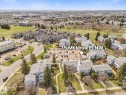 Aerial perspective showcasing a residential community with multiple structures - 35 Mcleod Place, Edmonton, AB  - Outdoor With View 