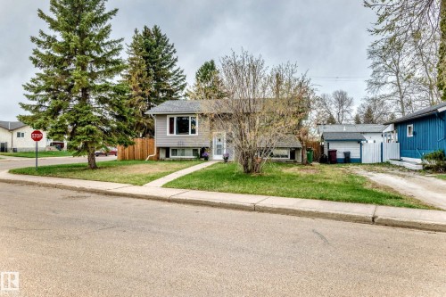 Split-level residence featuring gray siding and white trim - 3802 52 Street, Wetaskiwin, AB 