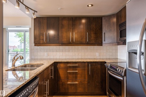 304 10046 117 Street, Edmonton, AB - Indoor Photo Showing Kitchen With Double Sink