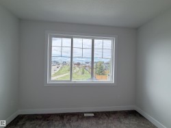 White trimmed window with gridded panes - 