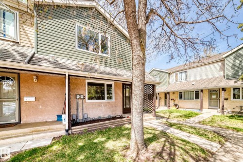 Townhouse exterior featuring a combination of horizontal siding and stucco finishes - 2578 138A Avenue, Edmonton, AB - Outdoor