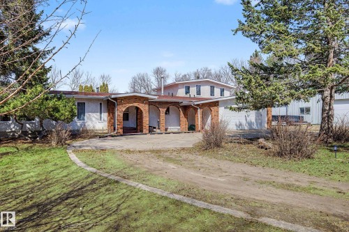 Brick archway entry and covered porch - 250 197 Avenue, Edmonton, AB - Outdoor