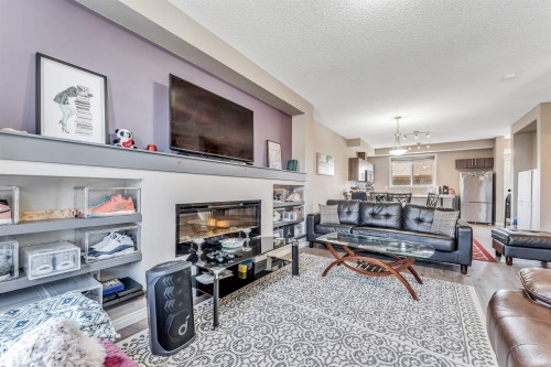 8041 Chappelle Way, Edmonton, AB - Indoor Photo Showing Living Room With Fireplace