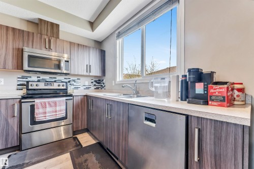 8041 Chappelle Way, Edmonton, AB - Indoor Photo Showing Kitchen With Double Sink