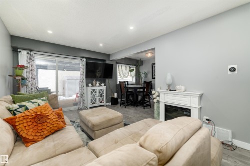 110 Centennial Court, Edmonton, AB - Indoor Photo Showing Living Room With Fireplace