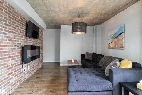 905 9940 112 Street, Edmonton, AB - Indoor Photo Showing Living Room With Fireplace