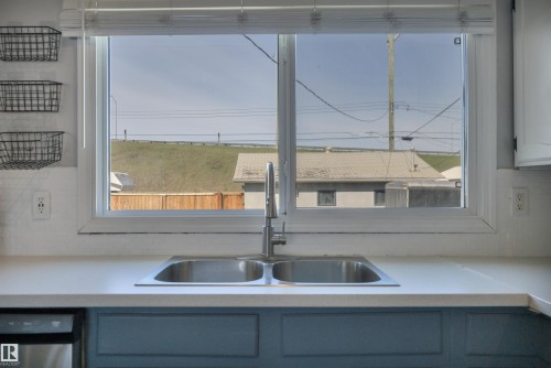 4316 53 Street, Leduc, AB - Indoor Photo Showing Kitchen With Double Sink