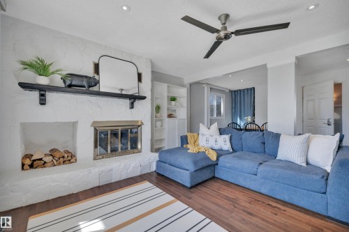 4316 53 Street, Leduc, AB - Indoor Photo Showing Living Room With Fireplace