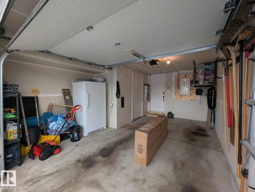 Additional space here for freezer, bikes etc. - 253 Marquis Boulevard, Edmonton, AB - Indoor Photo Showing Garage