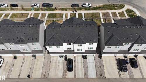 Rear alley access with parking pad and single attached garage. - 253 Marquis Boulevard, Edmonton, AB - Other