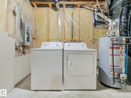 Image quality insufficient for description - 17 15128 22 Street, Edmonton, AB - Indoor Photo Showing Laundry Room