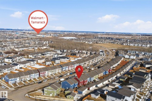 Aerial view of the neighborhood showcasing a variety of residential properties, including rows of attached homes - 2125 Maple Road Nw, Edmonton, AB - Outdoor With View