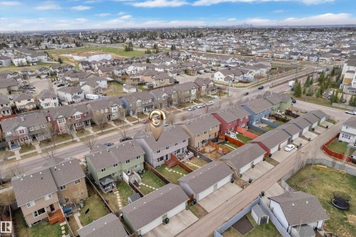 Residential neighborhood featuring a variety of detached and attached homes with individual backyards and garages - 2143 32 Street, Edmonton, AB - Outdoor With View