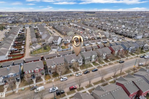 Residential neighborhood featuring a grid layout and numerous detached homes with varied architectural styles - 2143 32 Street, Edmonton, AB - Outdoor With View