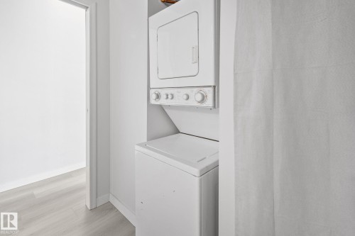 1312 10024 Jasper Avenue Nw, Edmonton, AB - Indoor Photo Showing Laundry Room