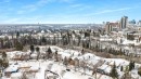 The property is located in a neighborhood featuring residential streets with snow-covered homes and trees - 7927 112S Avenue, Edmonton, AB  - Outdoor With View 