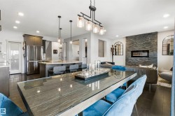 Open concept interior featuring dark wood-finish flooring - 