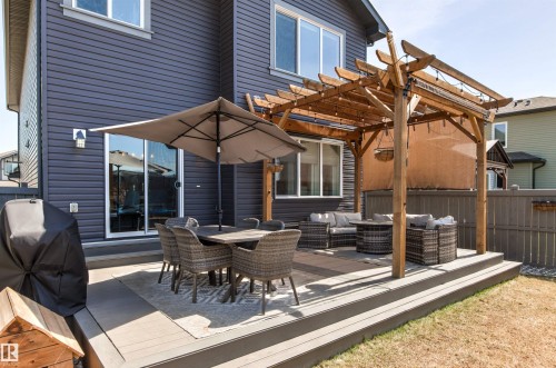 Expansive multi-level composite deck featuring a pergola - 7343 Armour Crescent, Edmonton, AB - Outdoor With Deck Patio Veranda With Exterior