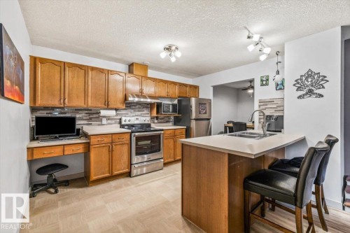 514 3 Perron Street, St. Albert, AB - Indoor Photo Showing Kitchen With Double Sink