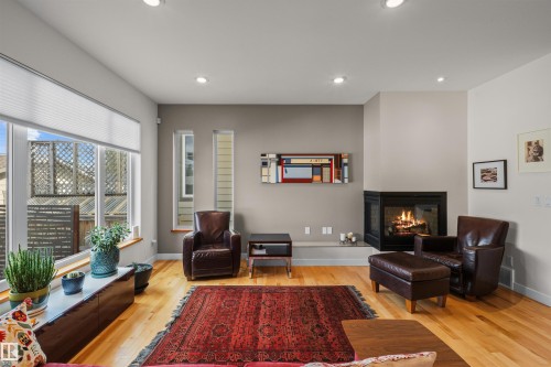 8839 93 Street, Edmonton, AB - Indoor Photo Showing Living Room With Fireplace