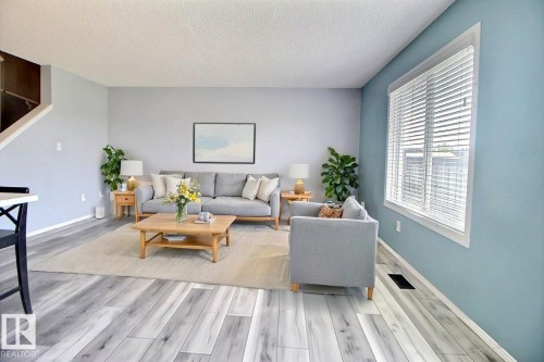 Virtually Staged - 170 Keystone Crescent, Leduc, AB - Indoor Photo Showing Living Room