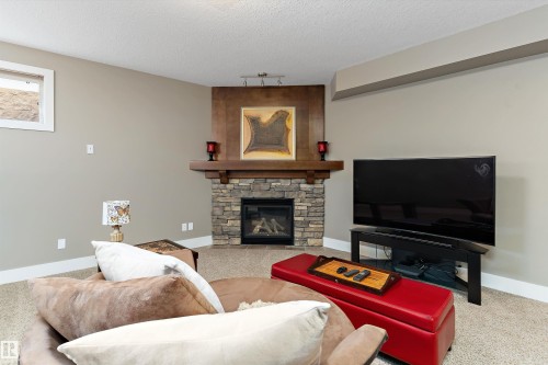 4628 Mead Place, Edmonton, AB - Indoor Photo Showing Living Room With Fireplace