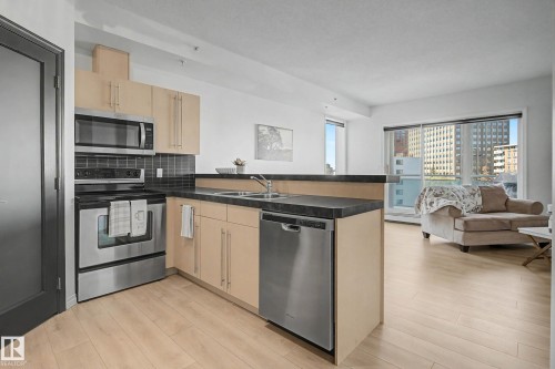 605 10504 99 Avenue, Edmonton, AB - Indoor Photo Showing Kitchen With Stainless Steel Kitchen With Double Sink
