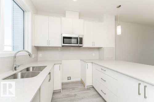 3896 Wren Crescent, Edmonton, AB - Indoor Photo Showing Kitchen With Double Sink