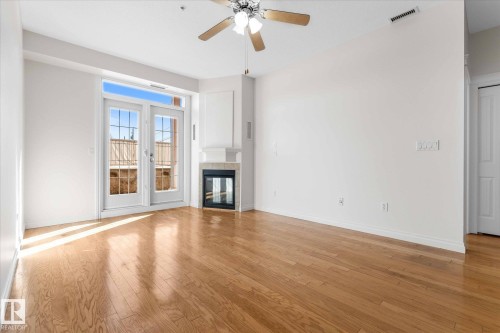 110 5211 50 Street, Stony Plain, AB - Indoor With Fireplace
