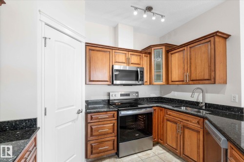 110 5211 50 Street, Stony Plain, AB - Indoor Photo Showing Kitchen With Double Sink
