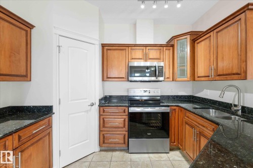 110 5211 50 Street, Stony Plain, AB - Indoor Photo Showing Kitchen With Double Sink
