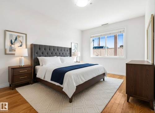 *Virtually Staged Image* - 110 5211 50 Street, Stony Plain, AB - Indoor Photo Showing Bedroom
