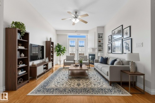 *Virtually Staged Image* - 110 5211 50 Street, Stony Plain, AB - Indoor Photo Showing Living Room