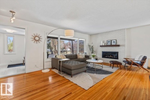8944 146A Street, Edmonton, AB - Indoor Photo Showing Living Room With Fireplace