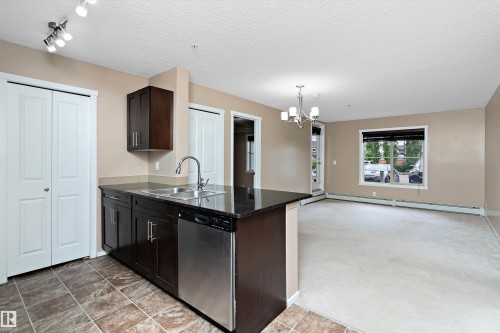 105 111 Watt Common, Edmonton, AB - Indoor Photo Showing Kitchen With Double Sink