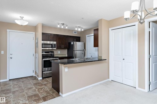 105 111 Watt Common, Edmonton, AB - Indoor Photo Showing Kitchen With Stainless Steel Kitchen