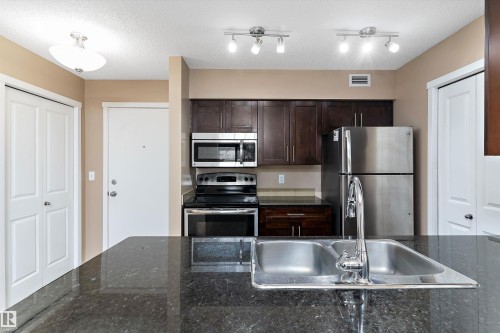 105 111 Watt Common, Edmonton, AB - Indoor Photo Showing Kitchen With Stainless Steel Kitchen With Double Sink